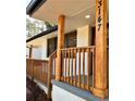 Close-up of the renovated front porch, featuring new railings and a freshly painted address at 3147 Bellgreen Way, Decatur, GA 30032