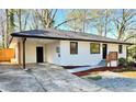 Beautifully renovated home featuring a freshly painted exterior and new landscaping at 3113 Bellgreen Way, Decatur, GA 30032