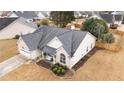 Aerial view of home featuring a well-kept yard, new roof, and front porch swing at 4037 Mcpherson Dr, Acworth, GA 30101