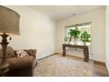 Cozy living room with natural lighting, hardwood floors, and calming decor at 200 Bexley Pkwy, Tyrone, GA 30290
