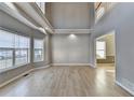 Spacious living room featuring soaring ceilings and an abundance of natural light at 4270 Fallbrook Dr, Duluth, GA 30096