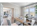 Elegant office space with natural light, double doors, and view to the dining area at 5955 Misty Hill Ln, Buford, GA 30518