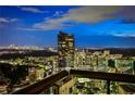 Stunning city view at night showcasing a high-rise building and the surrounding cityscape with illuminated buildings at 3376 Peachtree Ne Rd # 56, Atlanta, GA 30326