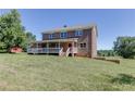 Charming two-story brick home featuring a welcoming front porch at 4840 Pisgah Rd, Cumming, GA 30028