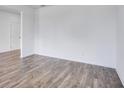 Spacious living room with sleek flooring and neutral walls, great for entertaining at 205 Groveton Ct, Euharlee, GA 30145