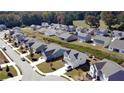 Aerial view showcasing a new residential community with well-spaced homes and landscaped surroundings at 60 Cottontail Lane, Villa Rica, GA 30180
