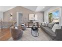 Cozy living room with hardwood floors, stylish furniture, and accent wall at 2117 Brannen Se Rd, Atlanta, GA 30316