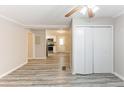 Inviting living room with view to kitchen, featuring gray floors and neutral paint at 6202 Humphries Hill Rd, Austell, GA 30106