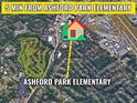 An aerial view shows the house's proximity, just 5 minutes from Ashford Park Elementary School at 2002 Wingate Rd, Atlanta, GA 30341