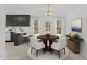 Charming dining area featuring lots of natural light and modern decor at 305 Bridgewater Ter, Canton, GA 30115