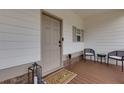 Cozy front porch featuring a sitting area for relaxing and enjoying the outdoors at 305 Parc Xing, Acworth, GA 30102