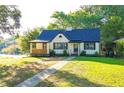 Charming single-Gathering home with beautiful lawn, walkway and front porch at 2702 Wedgewood Ter, Decatur, GA 30032