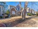 Lovely two-story house with a stone and siding exterior, neat front yard, and a welcoming entrance at 4526 Balto Way, Acworth, GA 30101