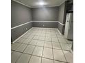 Clean, spacious dining area featuring tile floors and neutral walls, ready for personalized touches at 4762 Old Highgate Entry, Stone Mountain, GA 30083