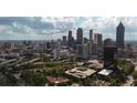 Breathtaking aerial view of the Atlanta skyline on a partly cloudy day at 446 Mcgill Ne, Atlanta, GA 30312