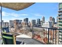 Relaxing balcony with comfortable seating and breathtaking views of the city skyline at 923 Peachtree Ne St # 1628, Atlanta, GA 30309