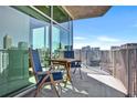 Inviting balcony with seating, perfect for enjoying city views and outdoor relaxation at 923 Peachtree Ne St # 1628, Atlanta, GA 30309