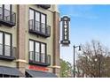 Exterior of building with 'The Lofts' signage and a State Farm on the ground floor at 5300 Peachtree Rd # 3506, Chamblee, GA 30341