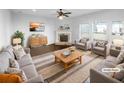 Bright living room features lots of natural light and a cozy fireplace that adds warmth and character at 362 Reserve Overlook, Canton, GA 30115