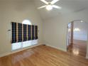 Bright living room featuring vaulted ceiling, hardwood floors, and custom window treatment at 2513 Galloways Farm Drive Nw, Acworth, GA 30101