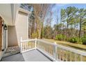 View from the porch of a home with a wooded background at 2745 Davenport Rd, Duluth, GA 30096