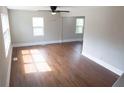 Bright living room with hardwood floors, neutral walls, and ample natural light at 444 Sargent Se Dr, Atlanta, GA 30315