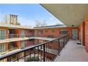 Brick apartment building features multiple floors and balcony access at 91 Rumson Ne Rd # C32, Atlanta, GA 30305