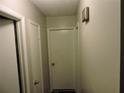 Hallway with multiple doors offering seamless access to various rooms within the home at 402 Pine Tree Trl, Atlanta, GA 30349