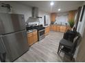 Modern kitchen featuring stainless steel appliances and granite countertops at 2077 Brockett Rd, Tucker, GA 30084