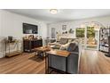 Spacious living room with hardwood floors, fireplace and natural light at 544 Stratford Grn, Avondale Estates, GA 30002