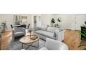 Bright living room featuring modern furniture, wood floors, and a neutral color palette at 1111 Clairemont Ave # P5, Decatur, GA 30030