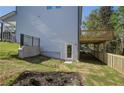 This home has a walk out basement and a second story deck overlooking the backyard at 746 River Gardens Dr Se # 746 River Gardens Dr Se, Atlanta, GA 30354