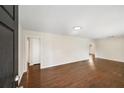 Bright and airy living room with gleaming hardwood floors at 793 Parkway Se Dr, Smyrna, GA 30080