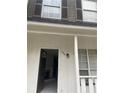Inviting front entrance with fresh paint, modern door hardware, and neutral colors at 498 Prince Of Wales, Stone Mountain, GA 30083