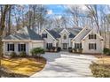 Gorgeous home with mature landscaping, attached garage and neutral color scheme at 285 Blackstock Rd, Villa Rica, GA 30180
