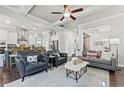 Bright living room with modern furniture and decor, open to the kitchen at 550 Onyx Lndg, Marietta, GA 30064