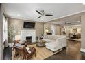 Bright living room with hardwood floors, fireplace, and neutral color palette at 1111 Seaboard Nw Ave, Atlanta, GA 30318
