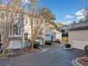 Beautiful townhome community with landscaped grounds, garages, and well-maintained exteriors at 1532 Oak Grove Rd, Decatur, GA 30033
