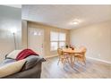Cozy dining area showcasing a round table, natural light, and neutral wall tones at 335 Old Airport Rd, Carrollton, GA 30116