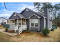 View of home's side and front showing neat landscaping and architectural details at 335 Old Airport Rd, Carrollton, GA 30116