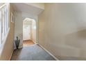 Inviting foyer showcasing carpeting and access to the main level with a staircase on the left at 917 Edgewater Cir, Marietta, GA 30062