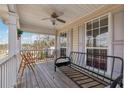 Inviting porch area featuring a swing and seating, perfect for relaxing outdoors at 3080 Autumn Woods Ct, Douglasville, GA 30135