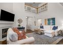 Spacious living room with high ceilings, fireplace, and elegant decor at 1514 Gilstrap Nw Ln, Atlanta, GA 30318