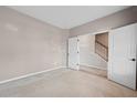 Bedroom with natural light and a view into the stairway at 61 Okeechobee Way, Braselton, GA 30548