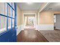 Bright foyer with hardwood floors, and white trim at 6005 Pattingham Dr, Roswell, GA 30075