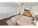 Bright bedroom features two large closets and a mid-century modern dresser at 43 Landmark Sw Ln, Marietta, GA 30060