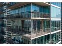 A corner balcony showing ample outdoor seating space with city views at 1080 Peachtree Ne St # 2011, Atlanta, GA 30309