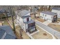 Aerial view of modern home with multi-level decks in a suburban neighborhood at 662 S Grand Nw Ave, Atlanta, GA 30318