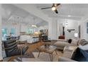 Open concept living room and kitchen with hardwood floors and white wood trim at 1464 Sagamore Ne Dr, Atlanta, GA 30345