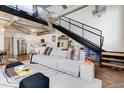 Spacious living area with an open floor plan, modern kitchen, and stylish furnishings at 400 Village Ne Pkwy # 114, Atlanta, GA 30306
